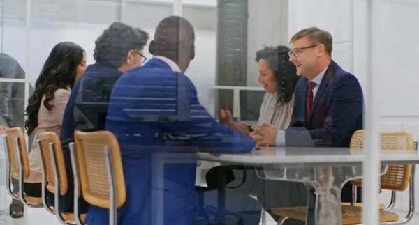 Financial professionals in conversation